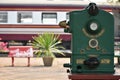 OldÃ¢â¬â¹ greenÃ¢â¬â¹ tokenÃ¢â¬â¹ machine for the railway transportation.